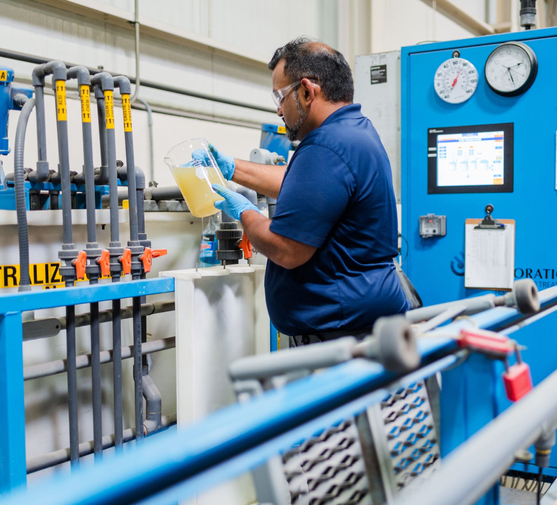 Operators Unlimited team member working at a customer wastewater plant