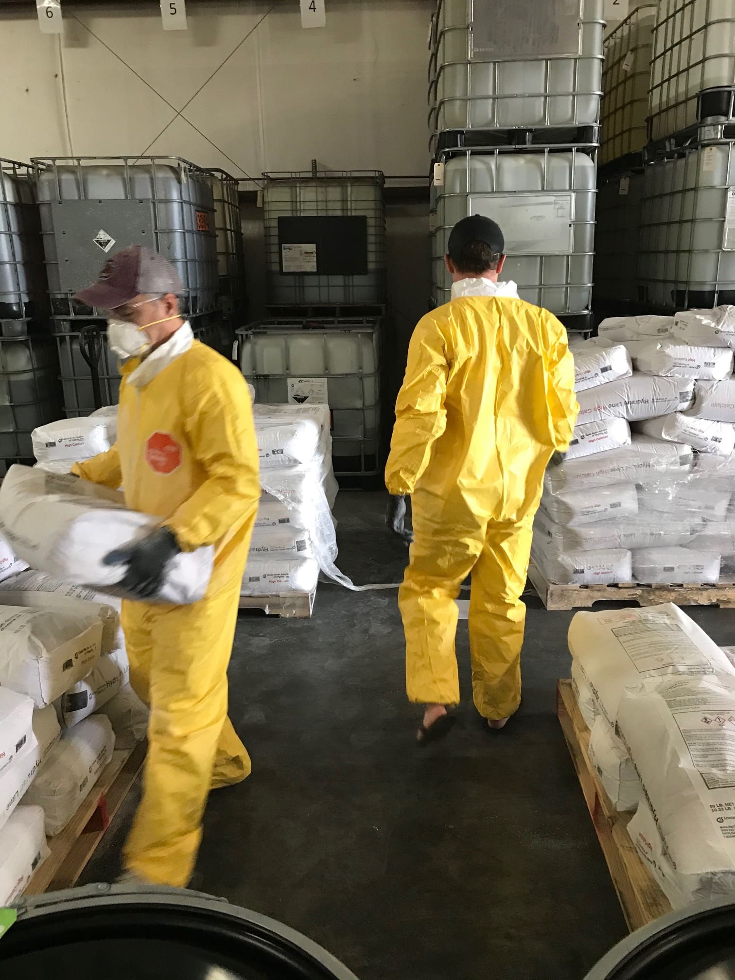 Warehouse workers with hydrated lime